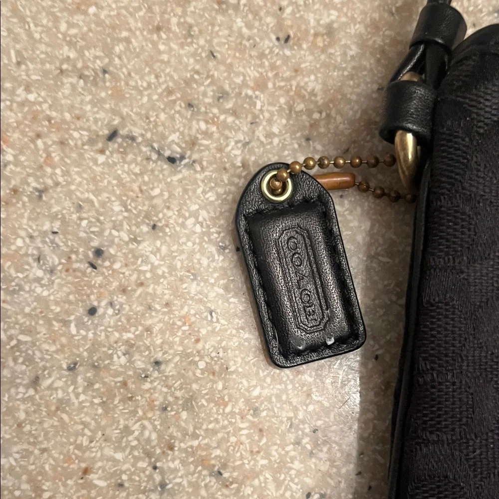 Coach Black Wristlet with Gold Emblem